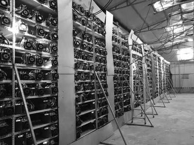 A large mining farm showing numerous mining rigs in operation